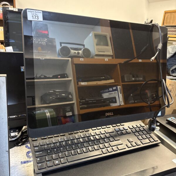 Dell Inspiron 22 all in one computer with keyboard and power supply.
