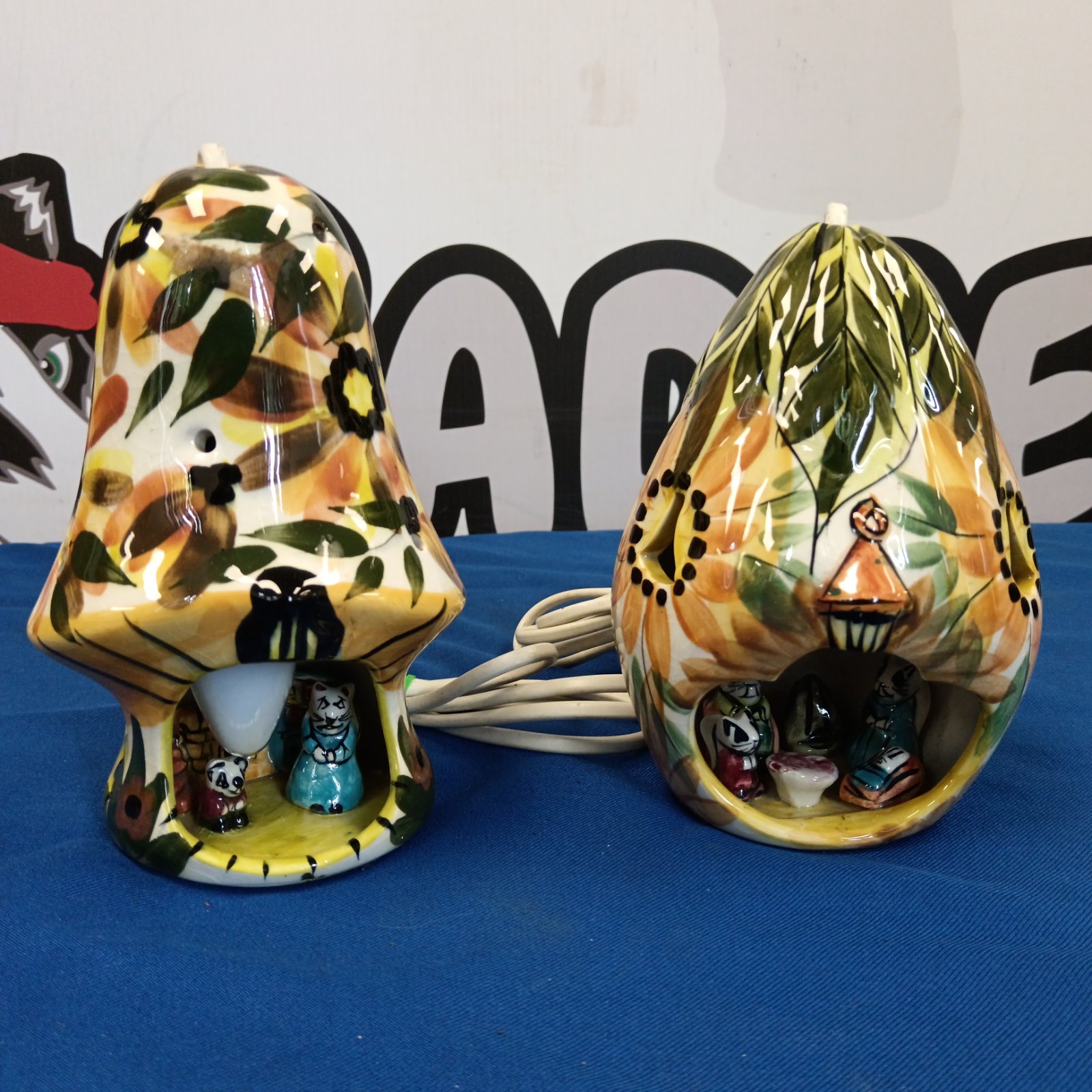 Pair of vintage Derek Fowler mouse house lamps with colourful ceramic bases.