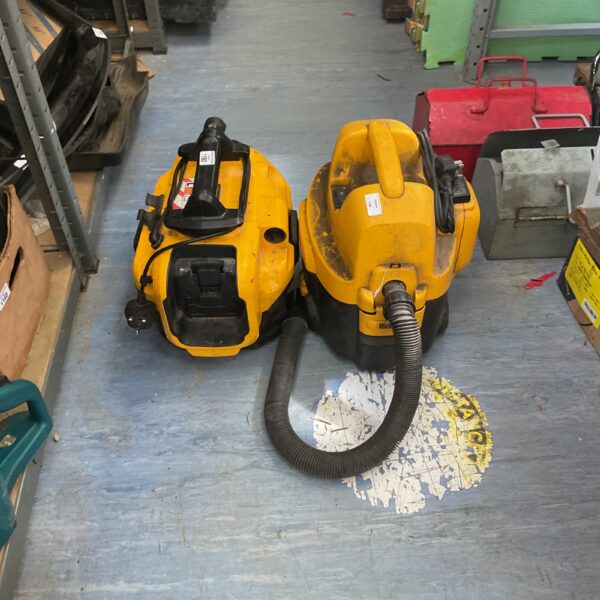Dewalt DCV581H cordless wet dry vacuum with hose attached.