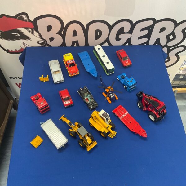 Vintage diecast car collection including Corgi Batmobile and Britains tractor.