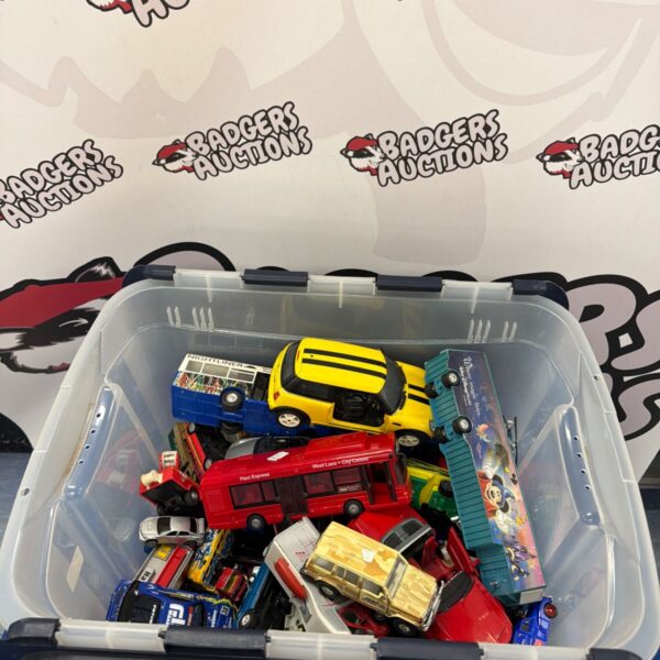 Mixed lot of colourful diecast toy cars in a plastic container.