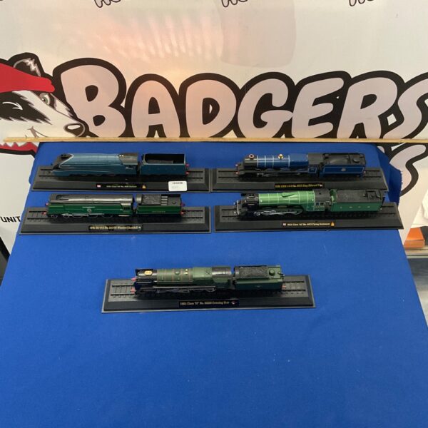 Lot of five display model locomotive trains for collectors.