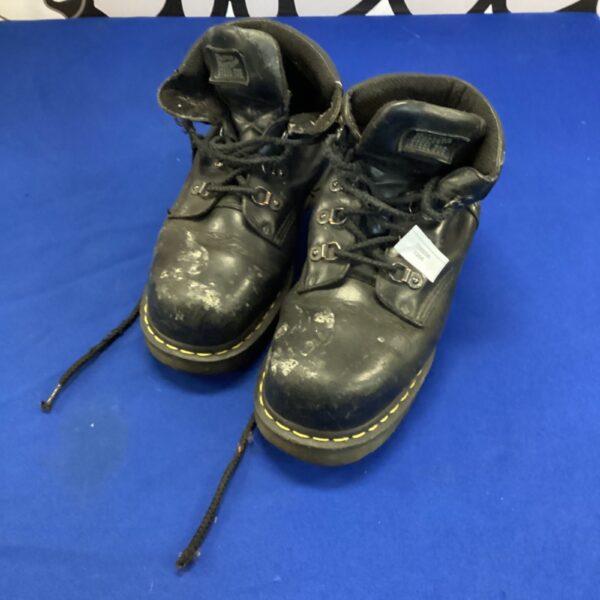 Vintage size 8 Doc Marten boots with worn leather.