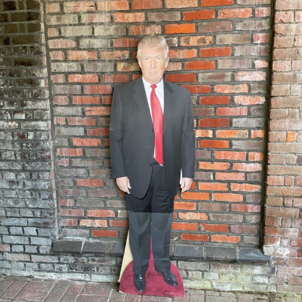 Life-size Donald Trump cardboard cutout for collectors and events.