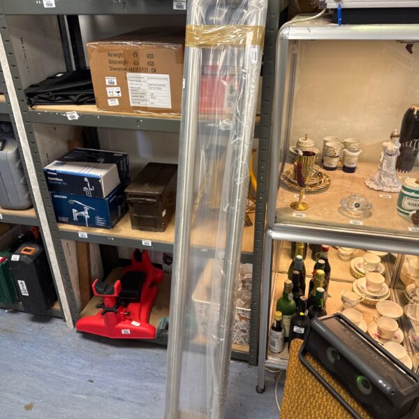 New pair of 1500mm brushed steel door handles in packaging.