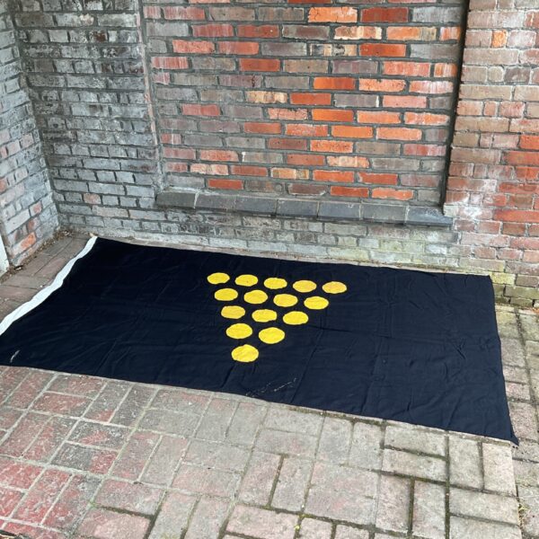 Large hand-stitched Duke of Cornwall coat of arms flag with yellow scallops.