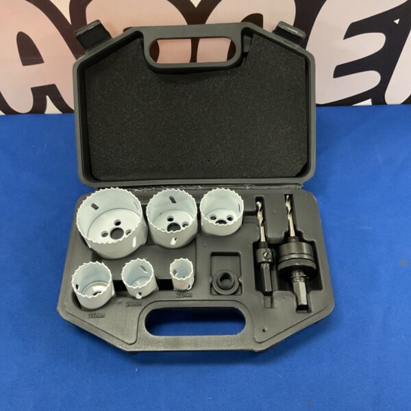 Electrician holesaw set with various sized holesaws and drill bit.