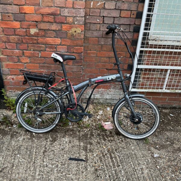 Elife Infusion folding bike with rear rack and black frame.