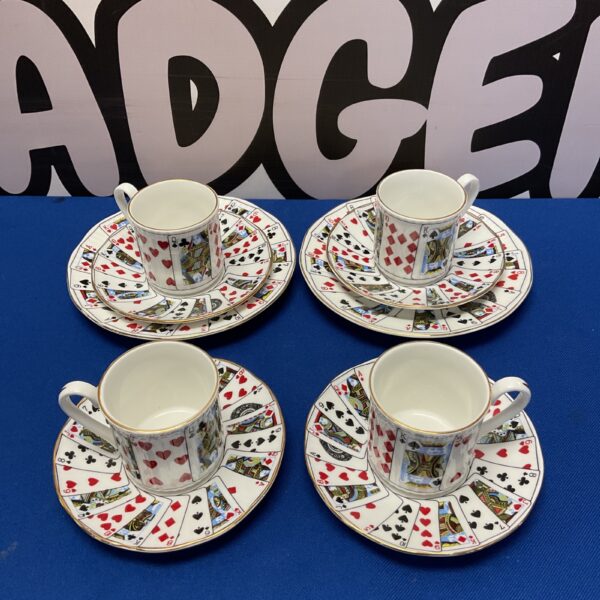 Vintage Elizabethan coffee cup and saucer with playing card design.