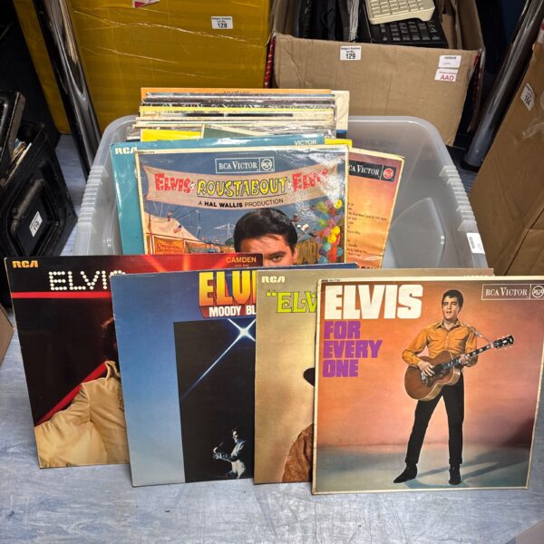Large lot of vintage Elvis Presley vinyl records for collectors.