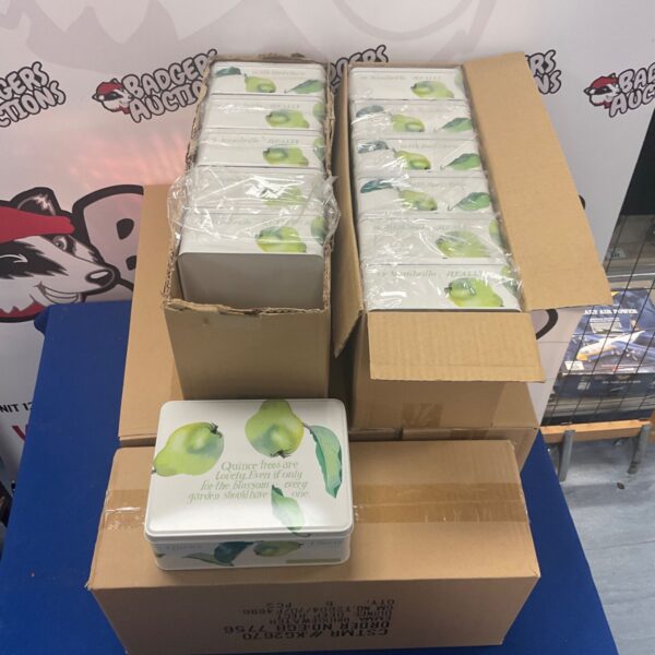Six boxes of Emma Bridgewater Quince design tins stacked together.