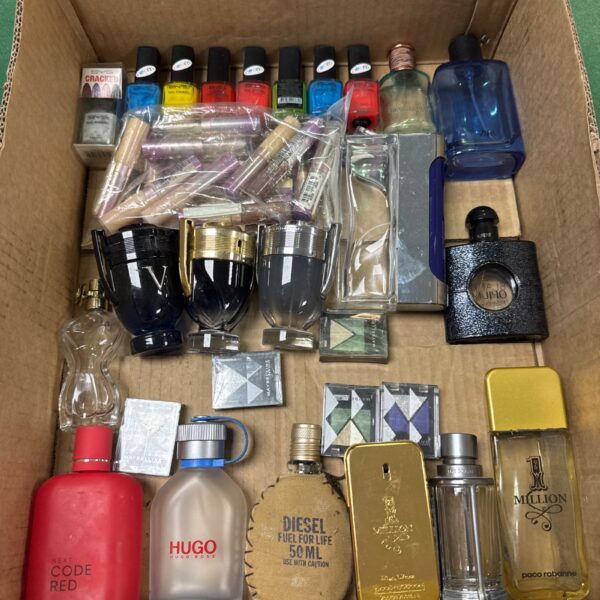 Mixed lot of empty perfume and aftershave bottles, including designer brands.