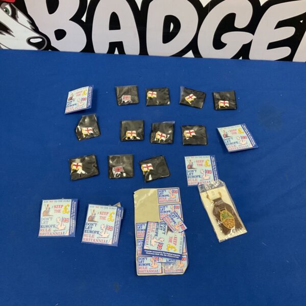 England and Union Jack badges with "Keep the Pound" slogan for collectors.