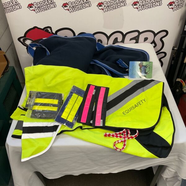 Bright yellow equestrian hi vis jacket with reflective strips.