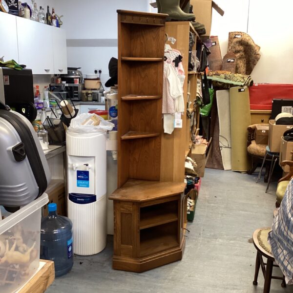 Vintage Ercol corner unit in beech, showcasing mid-century modern design.