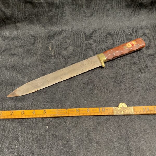 Vintage E T Markham Sheffield shear knife with wooden handle.