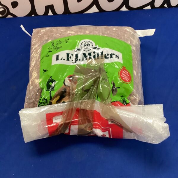 Used F. Miller bird seed bag with colourful branding.