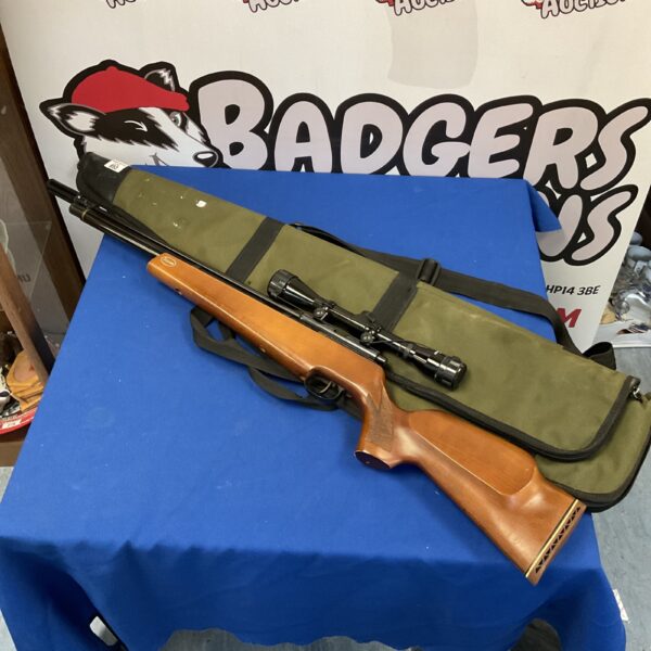 Falcon SWP 2700 air rifle with scope and wooden stock.