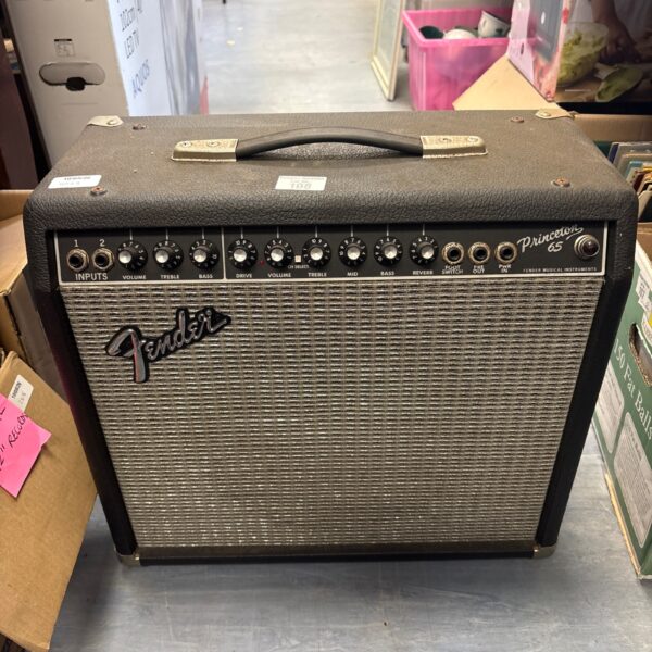 Vintage Fender Princeton 65 guitar amplifier with controls visible.