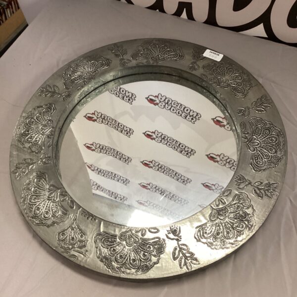Vintage floral silver effect wall mirror for home decor.