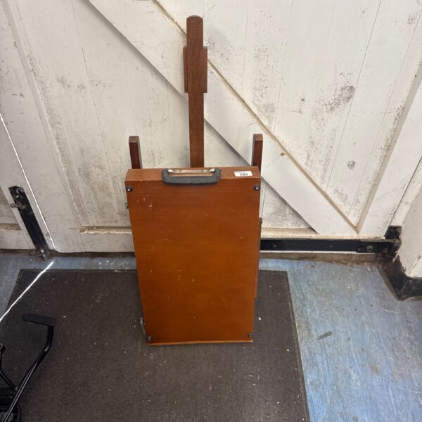 Vintage wooden folding artists easel box for painting.