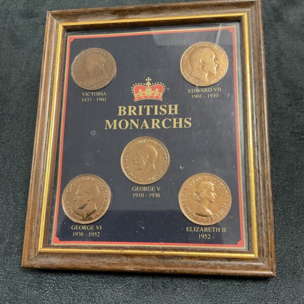 Framed collection of British Victorian and Edwardian pennies.