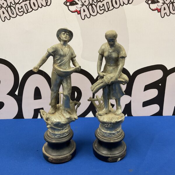 Antique French cast metal farm worker figures, vintage statuary.