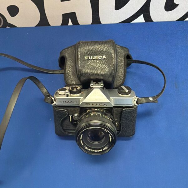 Vintage Fujica ST605N 35mm SLR camera with original case.