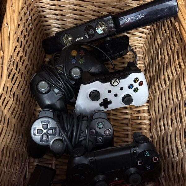 Gaming controller bundle featuring Xbox 360 and PlayStation controllers with Kinect.