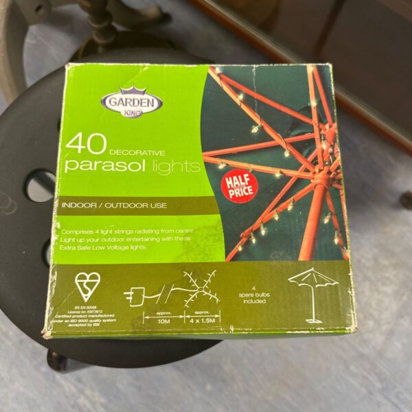 Vintage Garden King parasol lights in original packaging.