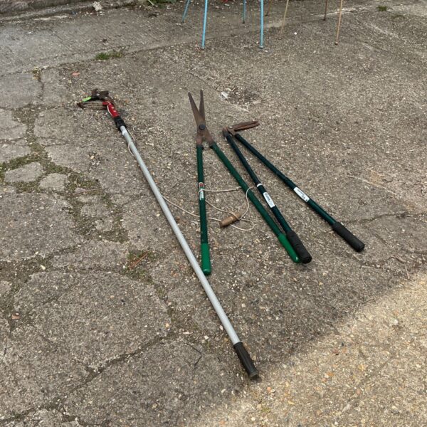 Garden loppers and shears for pruning and landscaping.
