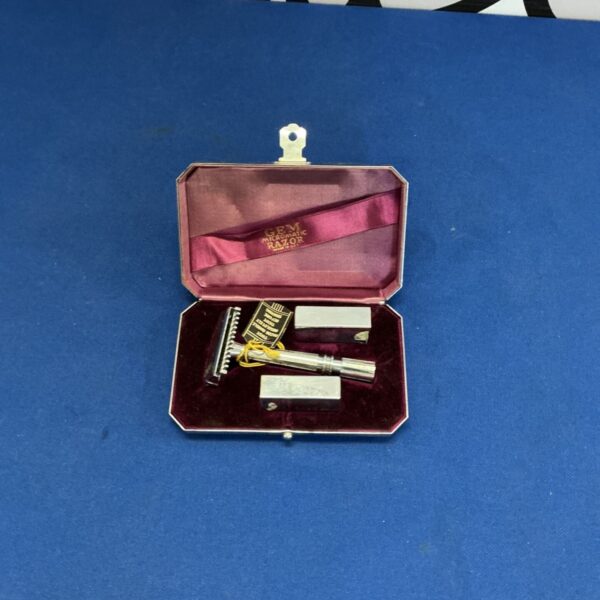 Closed vintage GEM Micromatic Razor Set in burgundy case.