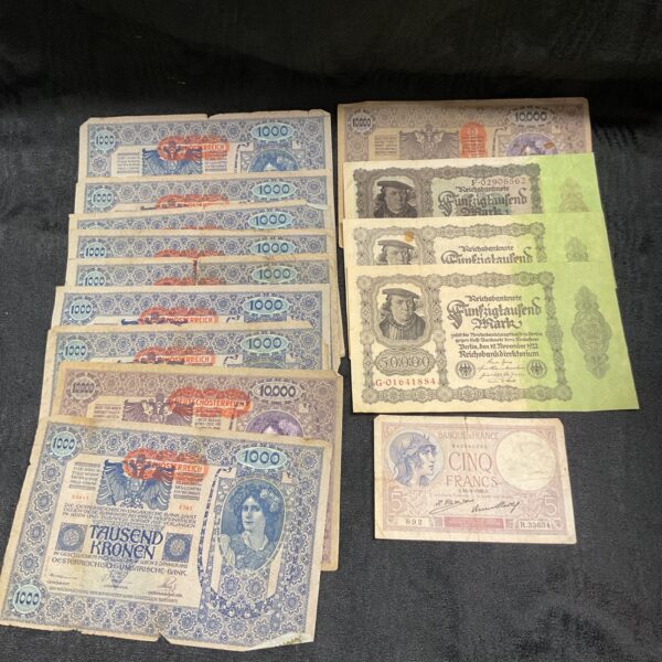 Collection of vintage German Reichsbanknotes from 1902 and 1922.