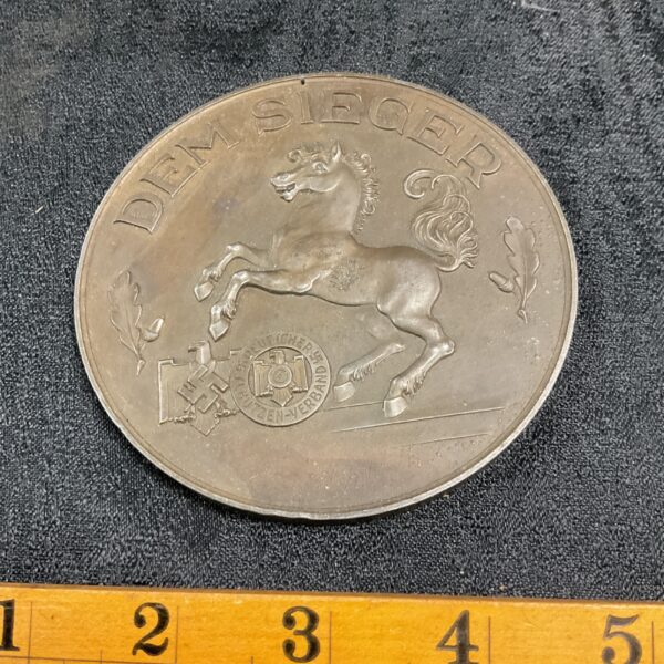 WWII German bronze plaque showing a rearing horse, "Dem Sieger" inscription.