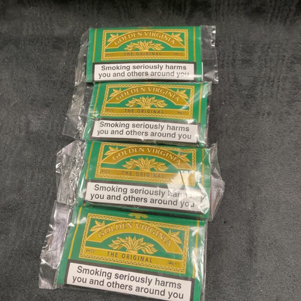 Sealed packs of Golden Virginia hand-rolling tobacco for collectors.