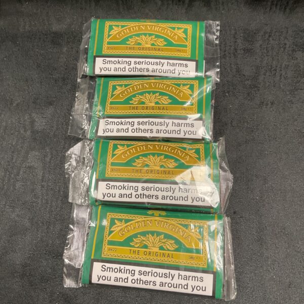 Sealed packs of Golden Virginia hand-rolling tobacco for collectors.