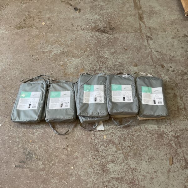 Stack of ten Goodhome sail shade triangles in packaging.