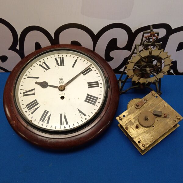 Vintage GPO post office wall clock with two clock movements.