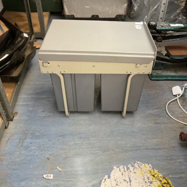 Grey kitchen waste bin designed for cabinet integration.