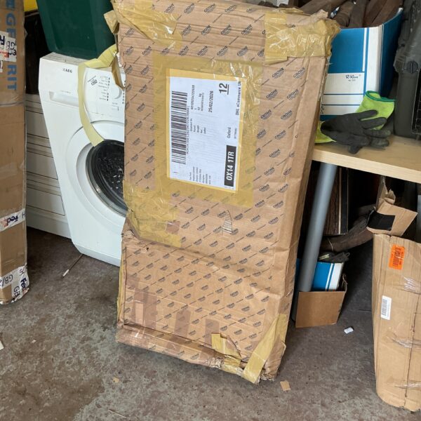 Used Grohe concealed cistern kit components in packaging.