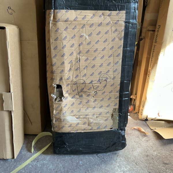 Grohe concealed cistern kit in damaged packaging.