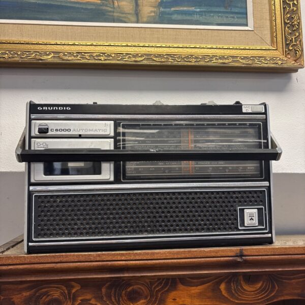 Vintage Grundig C6000 radio cassette recorder on a patterned surface.