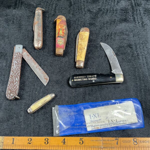 Vintage Guernsey Tomato Marketing Board pocket knife with colourful handle.