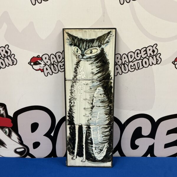 Hand painted ceramic tile featuring a black and white cat.
