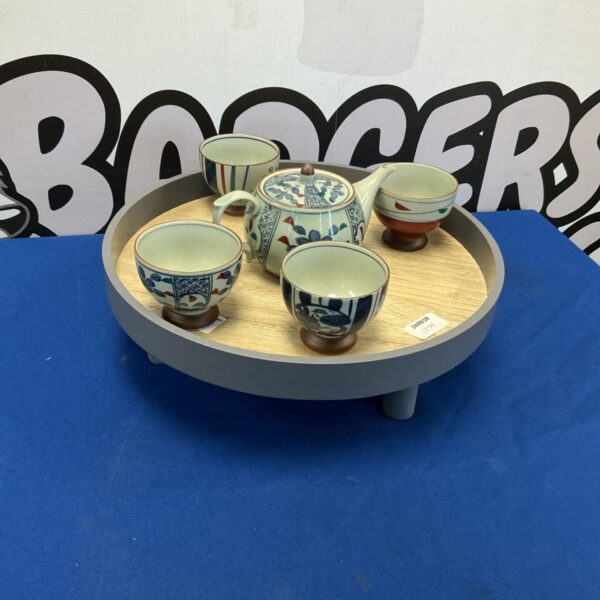 Handmade China tea set with teapot and two cups.