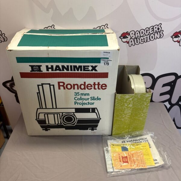 Hanimex Rondette 30 projector in original box, vintage photography equipment.