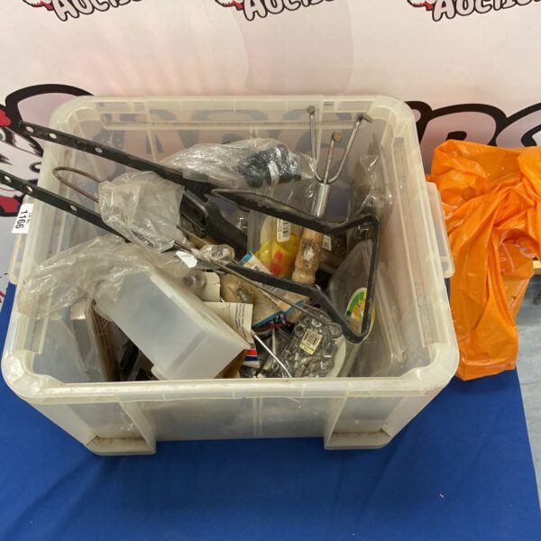 Assorted hardware and tools in a plastic tub, ideal for DIY projects.