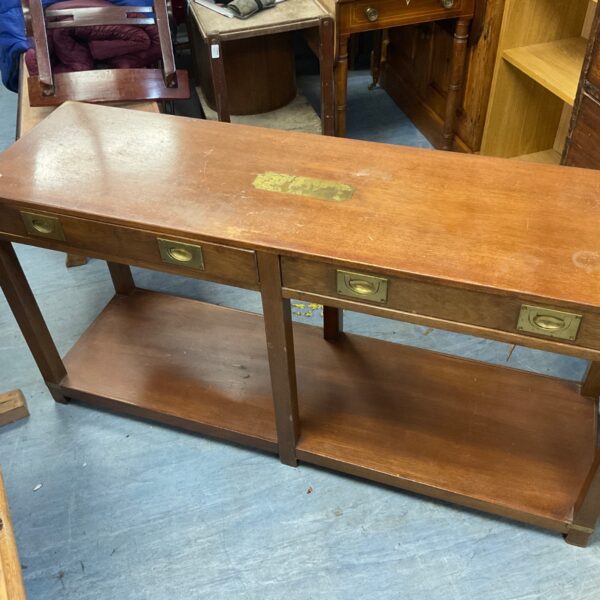 Vintage mahogany military campaign console table with brass handles.
