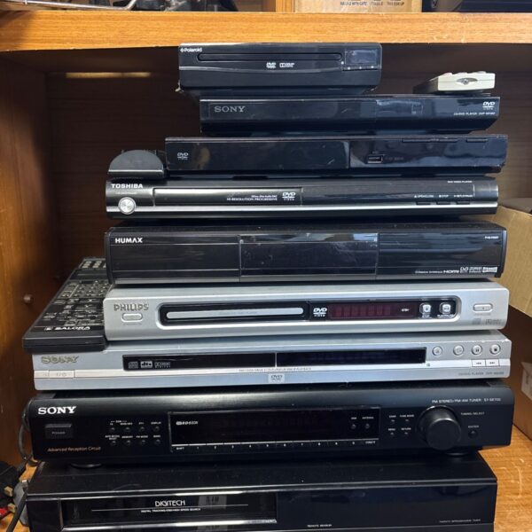 Mixed hi-fi stack including Humax, Sony, and Toshiba DVD players.
