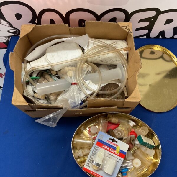 Mixed lot of homebrewing equipment and accessories for beer making.